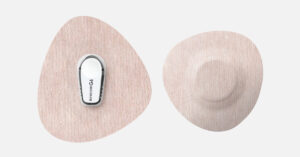 Dexcom G6 patch next to Dexcom G7 patch showing different sizes and cutout shapes - Not Just a Patch dexcom adhesive patches for each device generation